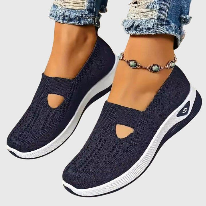 Women's orthopaedic slip-on shoes in a neutral color, offering comfort and bunion relief.