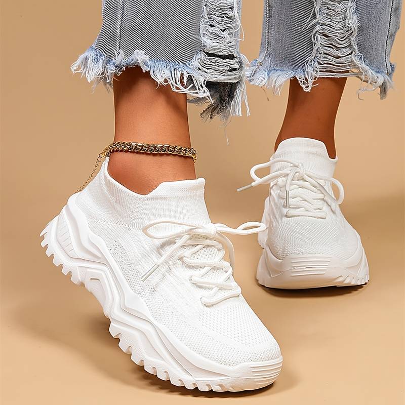 Women's orthopaedic sneakers in grey, designed for enhanced arch support & ultimate comfort. Ideal walking shoes.