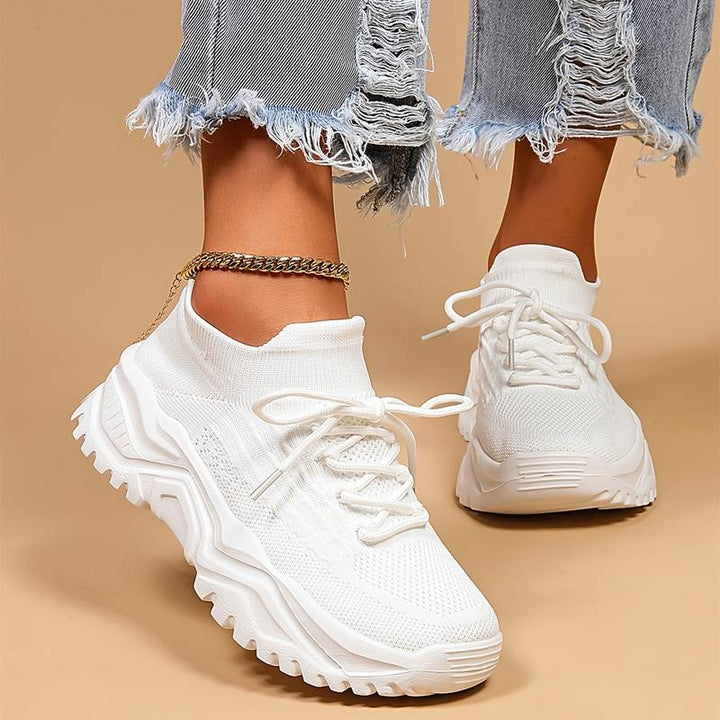 Women's orthopaedic sneakers in grey, designed for enhanced arch support & ultimate comfort. Ideal walking shoes.