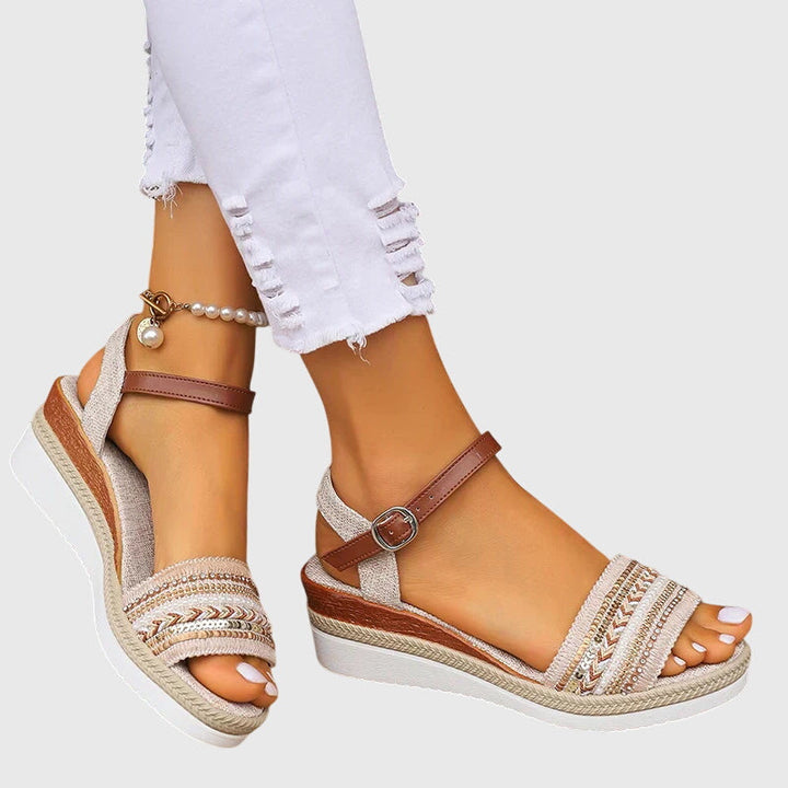 Chic women's boho summer sandals with adjustable straps, providing lightweight comfort and foot support.