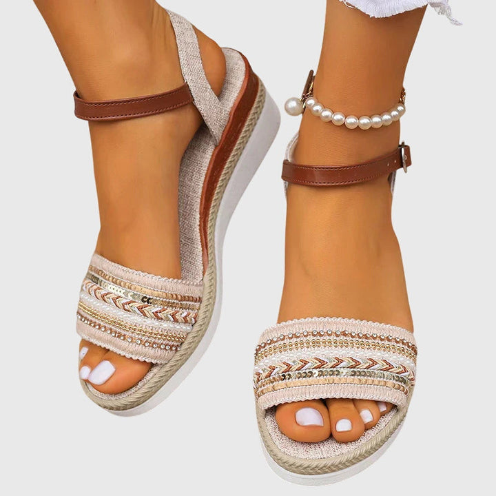 Lightweight women's summer sandals with orthopaedic design, adjustable straps for comfortable, casual wear.