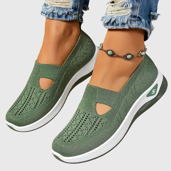 White women's walking shoes with breathable upper & cushioned sole, ensuring all-day comfort for active women.