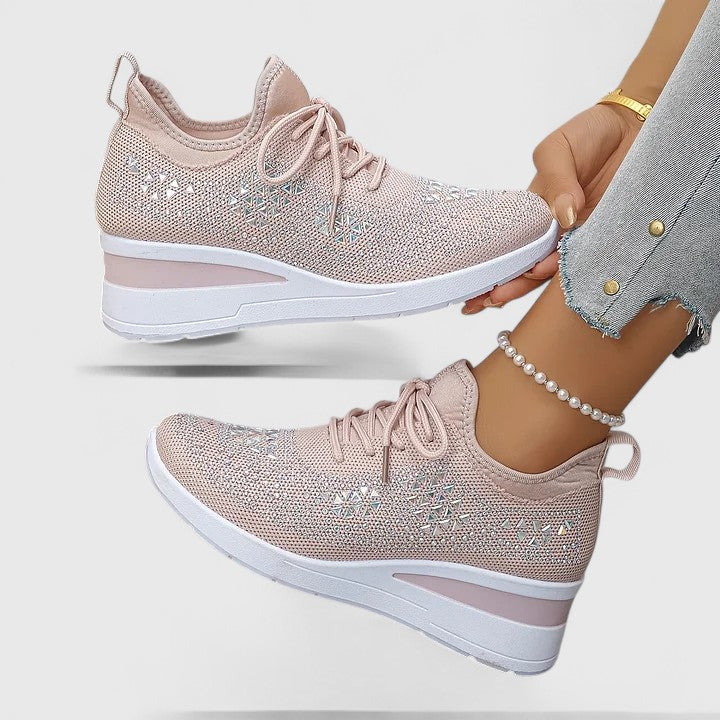 Pair of women's orthopaedic shoes designed for maximum comfort, arch support, & style.