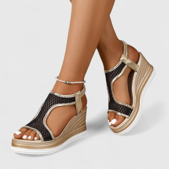 Black orthopaedic wedge sandals for women, ensuring all-day comfort and stylish support.
