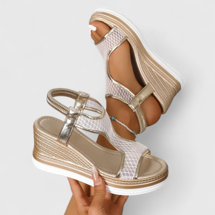 Stylish orthopaedic wedge sandals for women, featuring arch support and ultimate comfort.