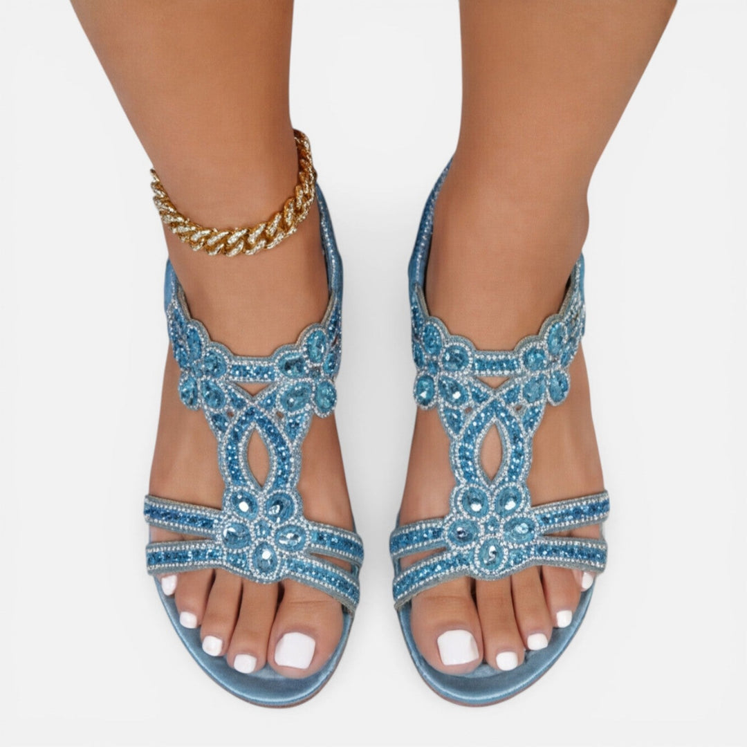 Supportive women's floral wedge sandals, orthopaedic design provides arch support for summer comfort.