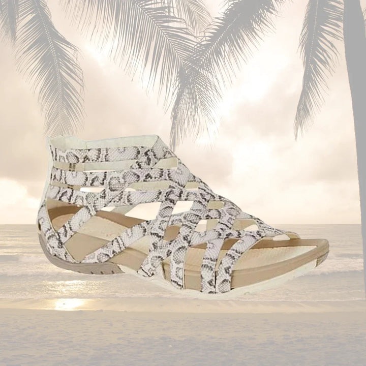 Lightweight women's orthopedic caged sandals with adjustable straps and convenient zip.