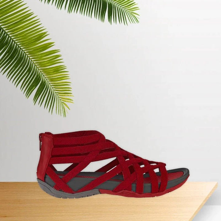 Arch support women's flat sandals. Adjustable strappy design, essential orthopedic footwear.