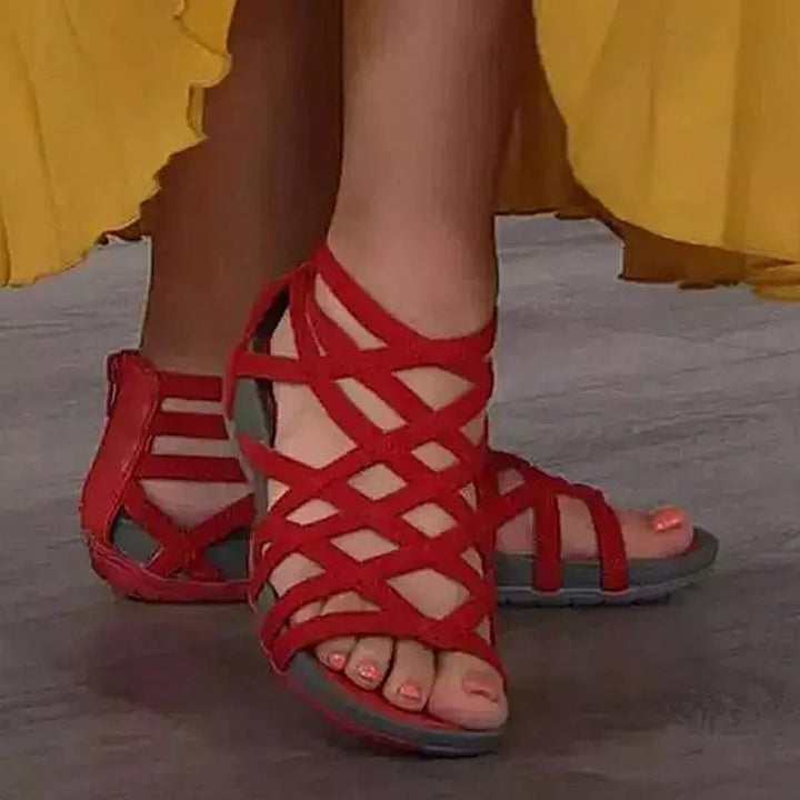 Supportive women's flat strappy sandals. Adjustable for comfort, ideal orthopedic footwear.