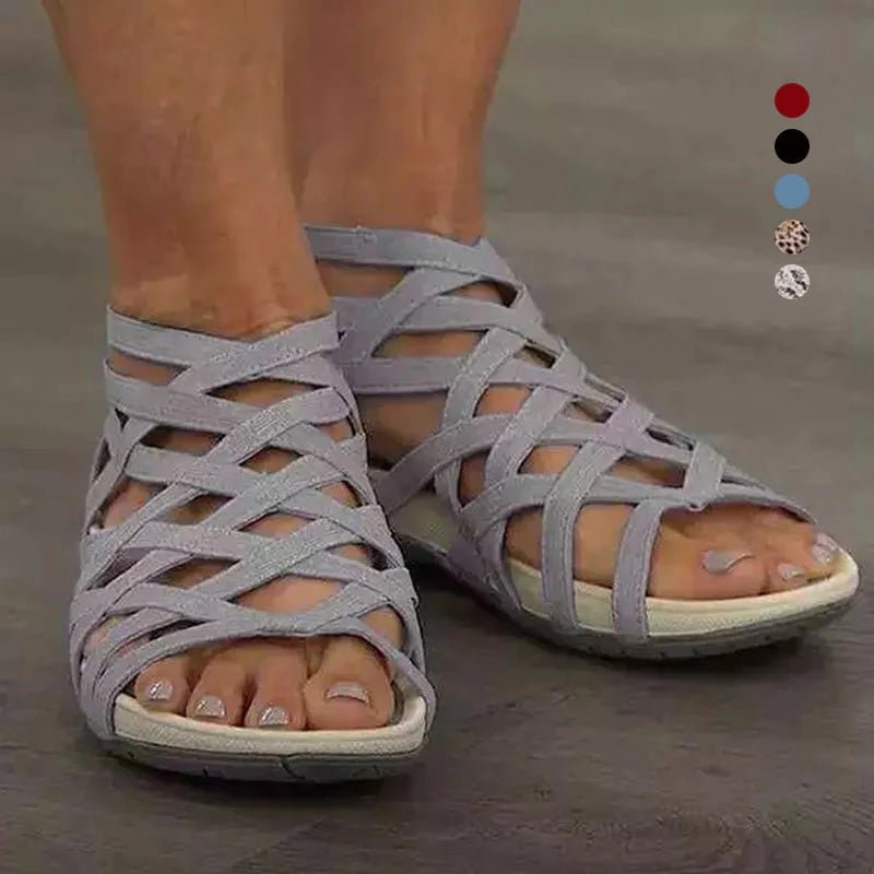 Adjustable strappy flat sandals for women, offering orthopedic arch support & casual elegance.