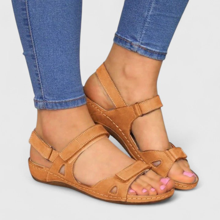 Comfort fit women's flat sandals with ankle strap, perfect for casual summer outings & travel. Orthopedic support.