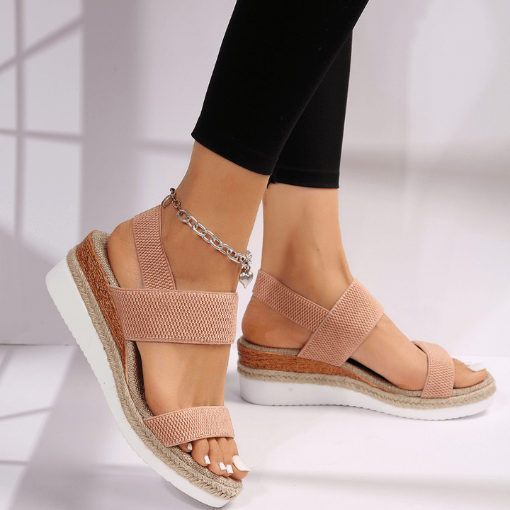 Stylish women's orthopedic sandals, featuring an ankle strap, platform, and espadrille design for summer.