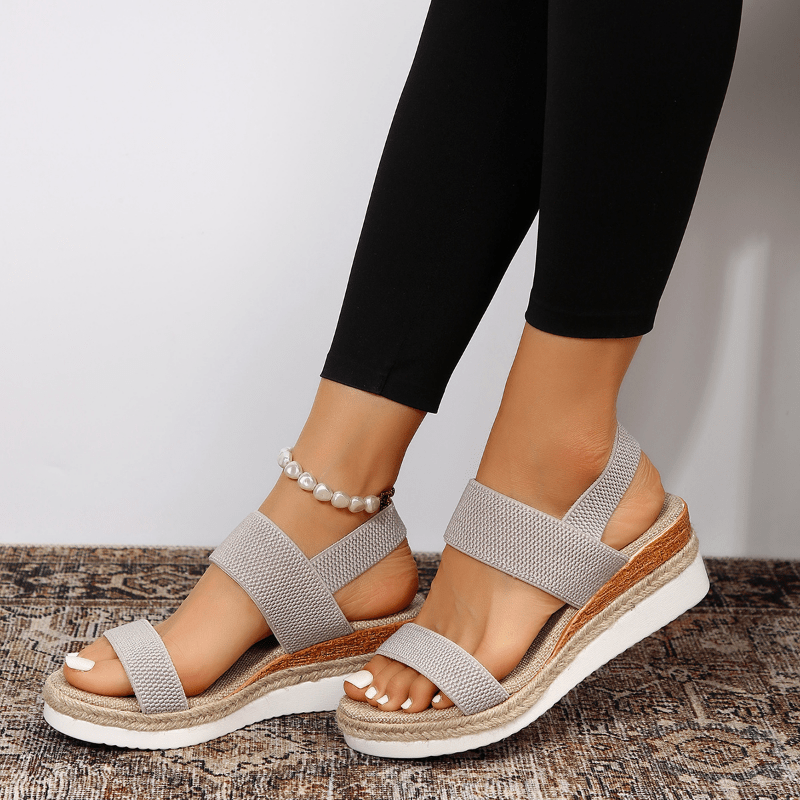 Versatile women's sandals: orthopedic design, ankle strap, platform, and espadrille for comfort and style.