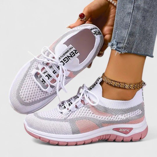 Comfortable women's walking shoes, orthopedic design with arch support and lace-up closure.