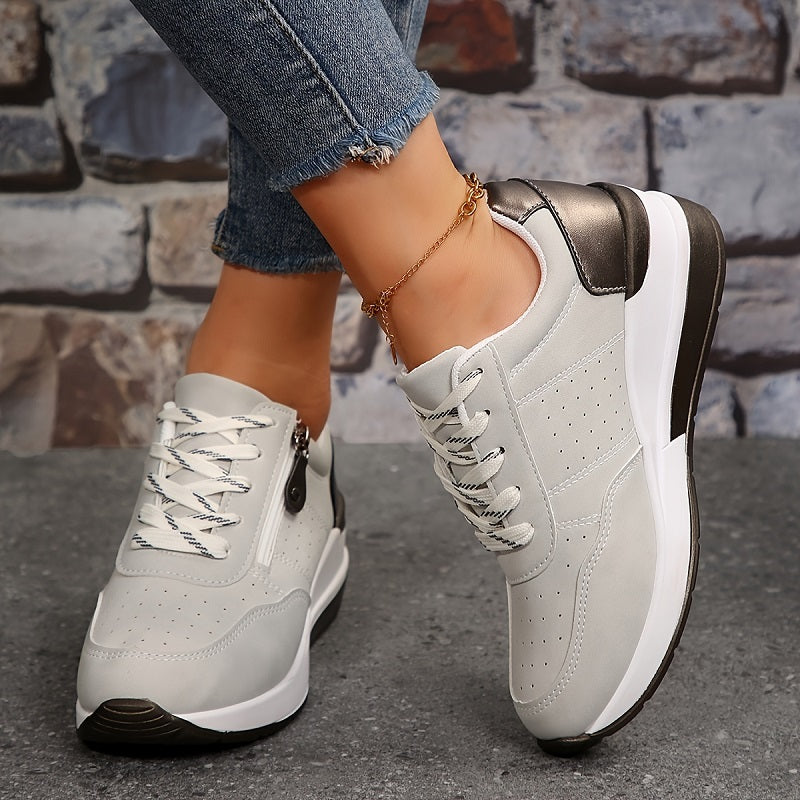Supportive women's orthopedic sneakers with advanced arch support for ultimate comfort and stability.