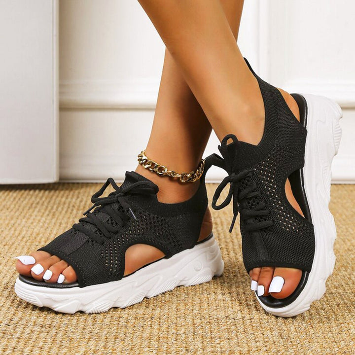 Cushioned women's orthopedic sandals, lace-up athletic style, perfect for walking & summer comfort.