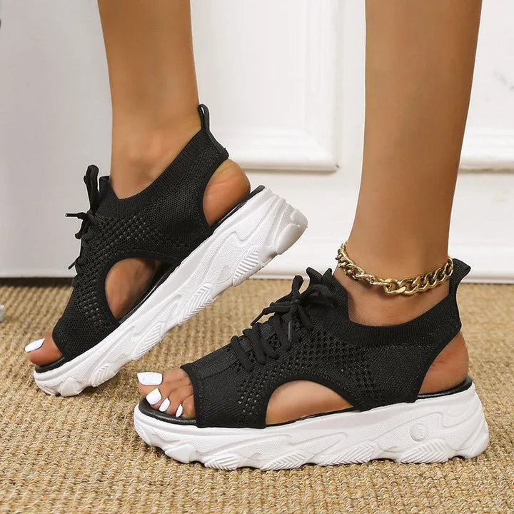 Sporty women's lace-up orthopedic sandals with arch support, cushioned for active summer wear.