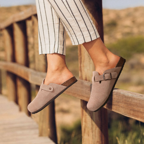 Comfortable women's orthopedic indoor slippers providing foot support & balance. Soft, easy slip-on home shoes.