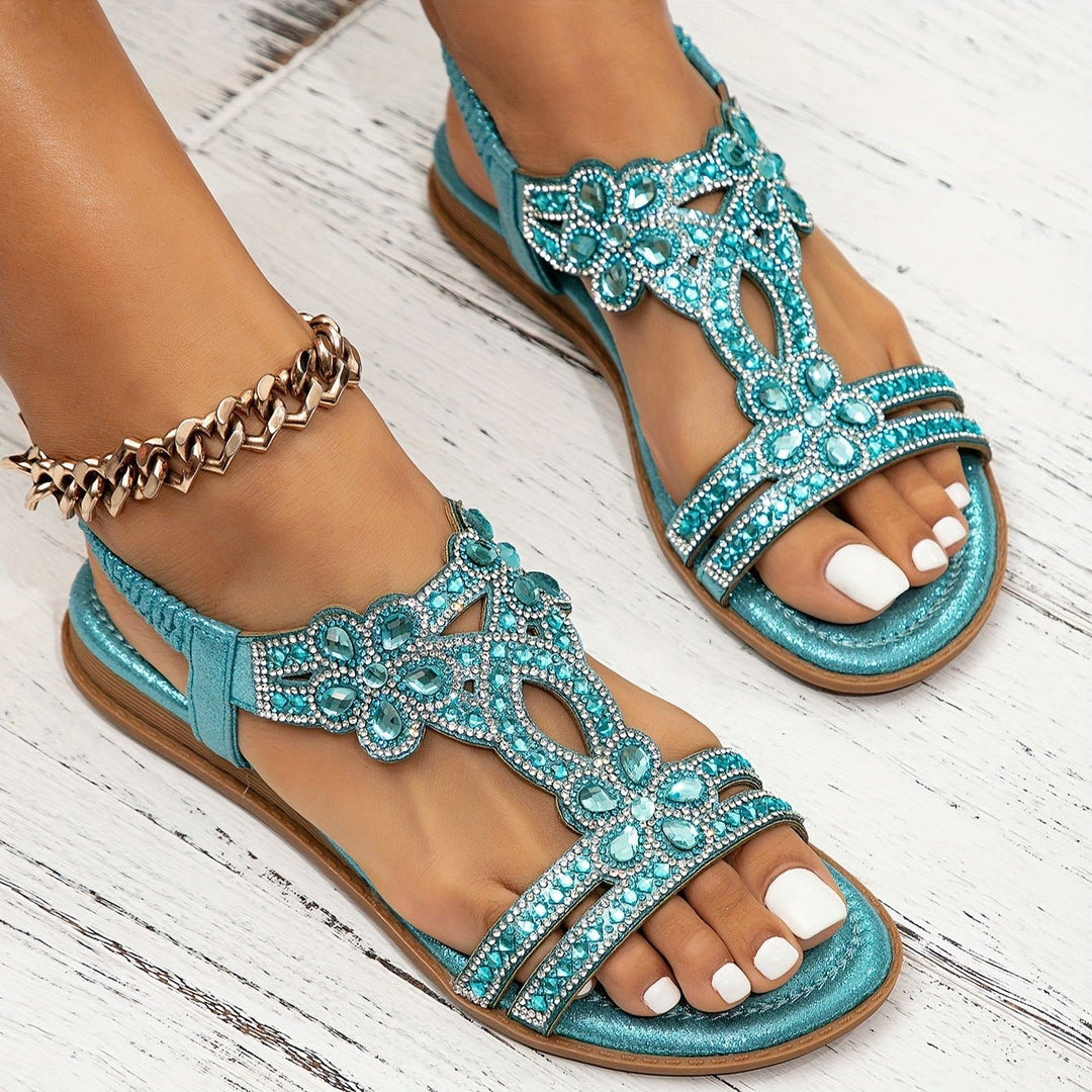 Comfortable women's bohemian flat sandals, embellished with beads, offering orthopedic support.