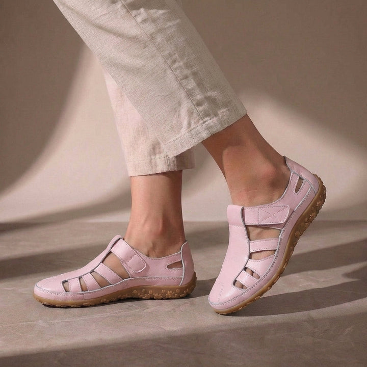 Women's closed-toe orthopedic sandals with adjustable straps, ideal supportive summer footwear.