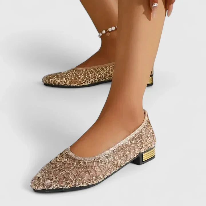 Silver slip-on comfort loafers for women, designed with foot support for easy, pain-relieving walking.