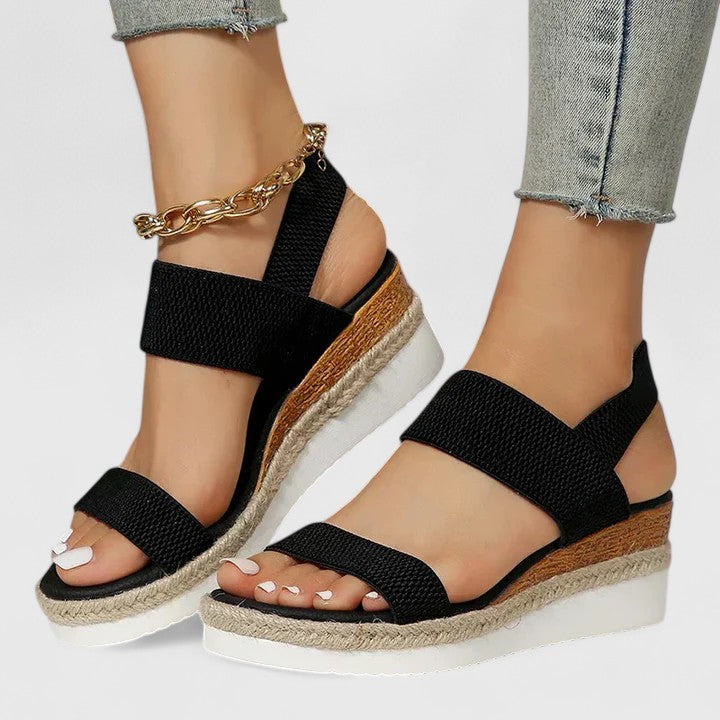 Adjustable strap women's orthopedic sandals providing secure, comfortable foot support for walking.