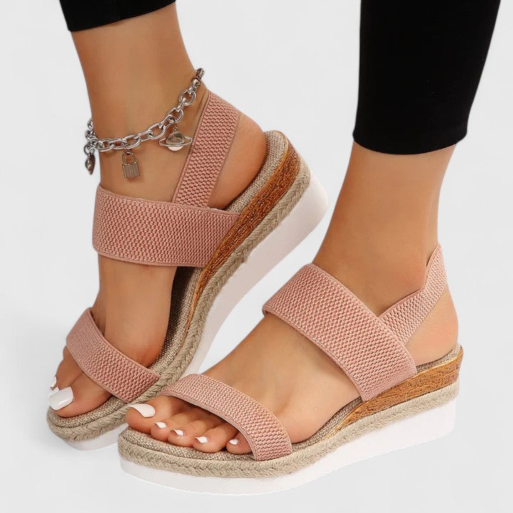 Close-up of women's orthopedic sandals, highlighting adjustable straps and comfortable, lightweight material.