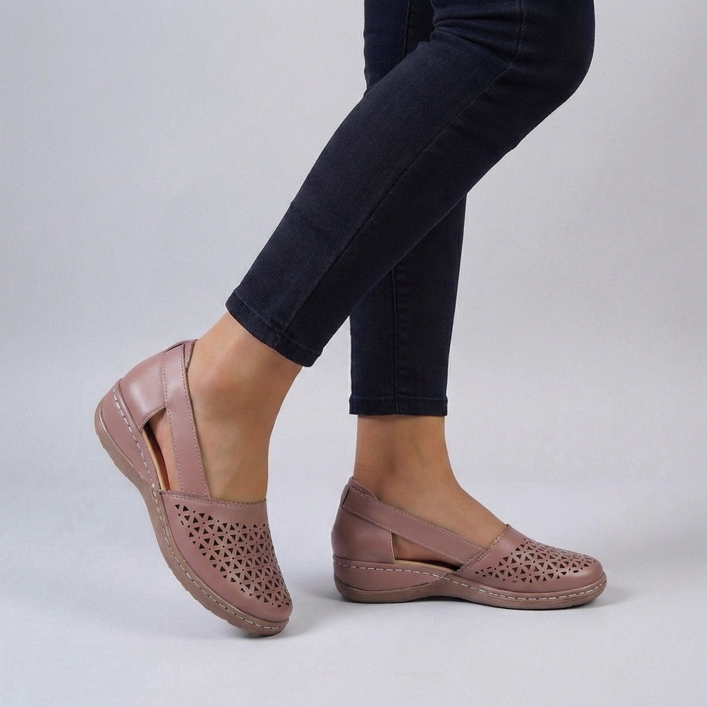 Slip-on women's orthopedic comfort sandals with elegant scalloped details, offering supportive casual footwear.
