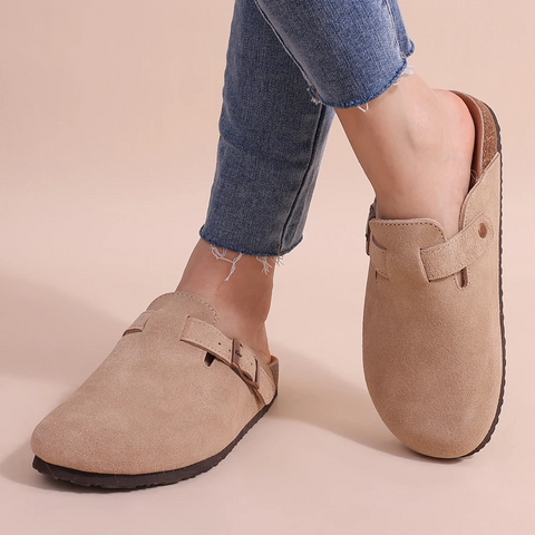 Slip-on women's orthopedic slippers with superior arch support for ultimate comfort & pain relief.