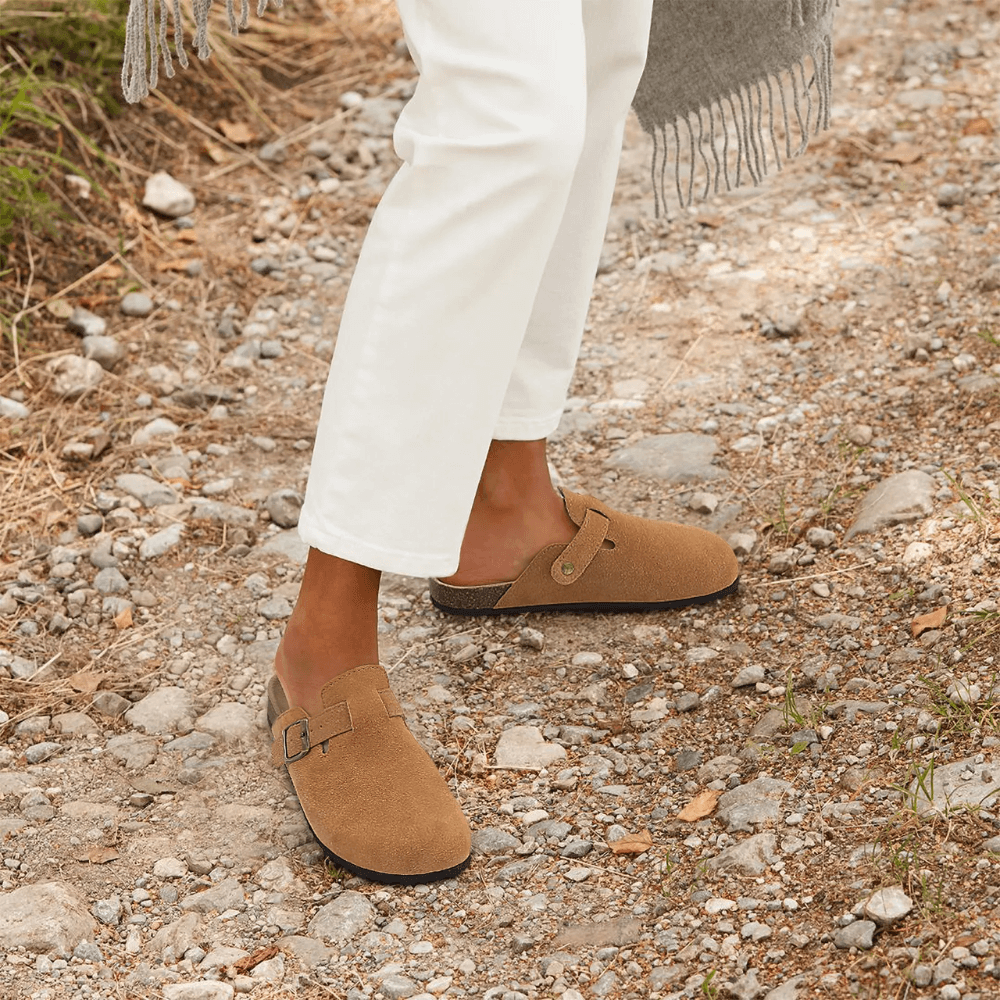 Soft anti-slip women's comfort slippers, ideal for indoor & outdoor use with superior arch support.