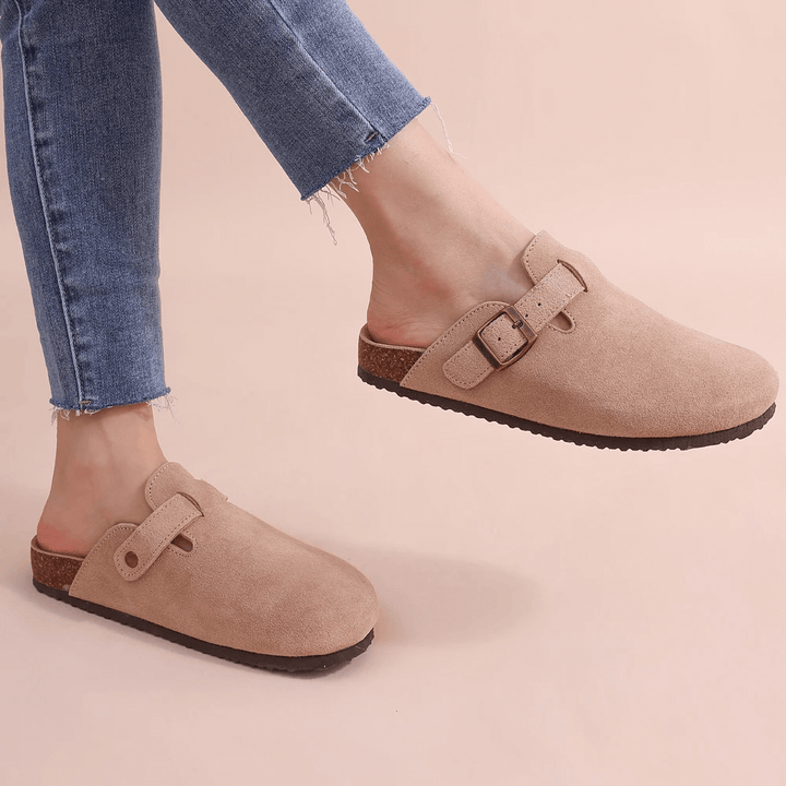 Plush women's comfort slippers with ergonomic arch support, perfect for cozy everyday wear.