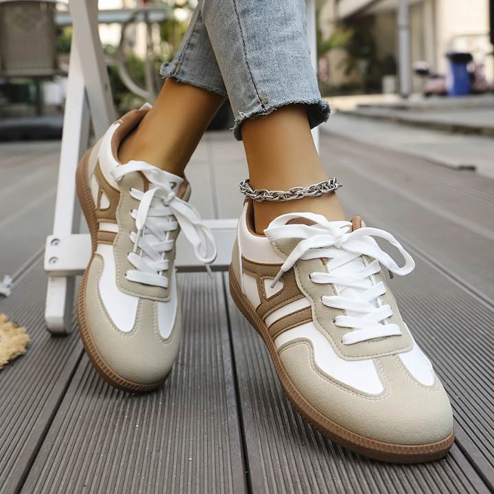 Side view of women's orthopedic walking sneakers, highlighting stable design and superior arch support for comfort.