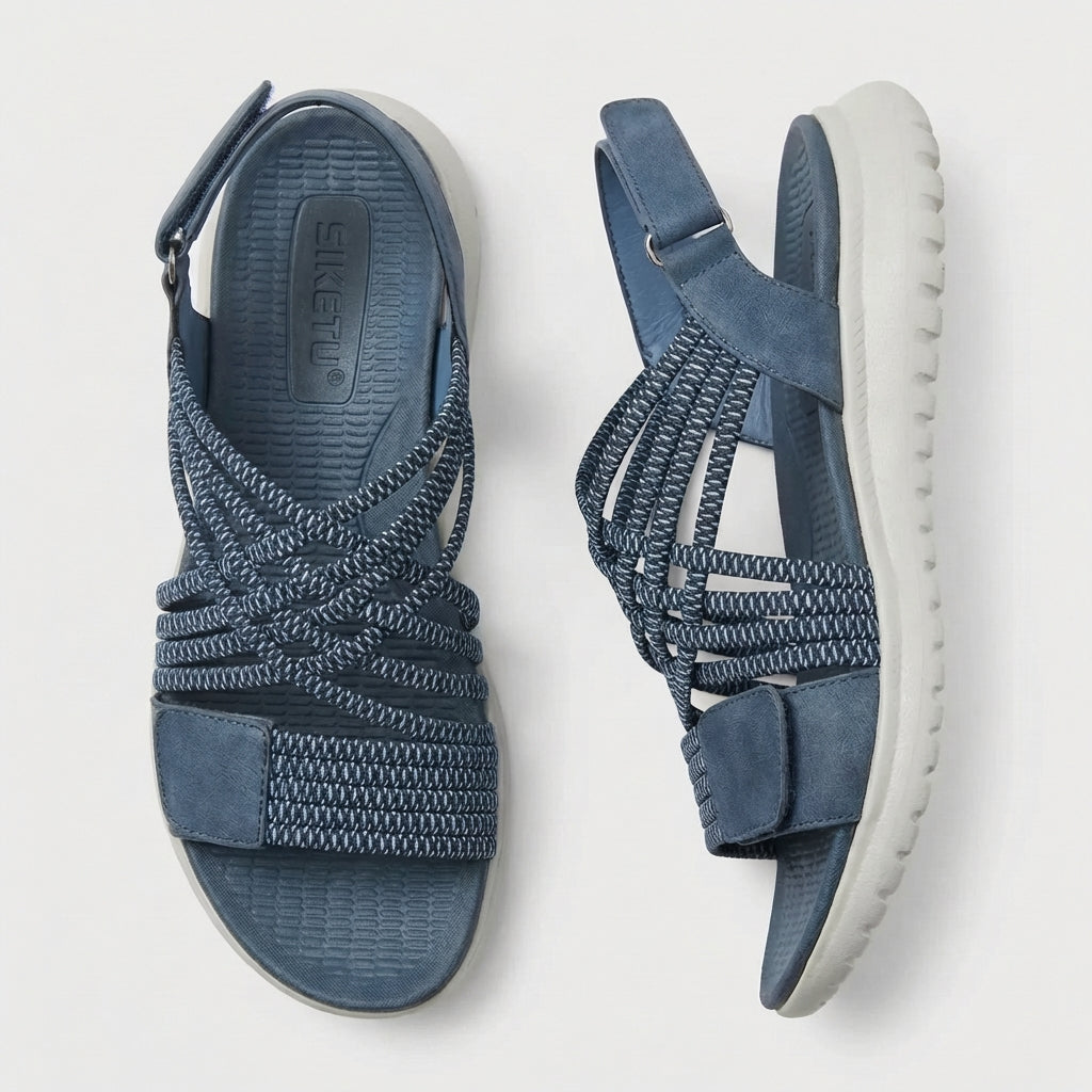 Fashionable orthopedic sandals for women, featuring a criss-cross strap for ultimate comfort & travel.