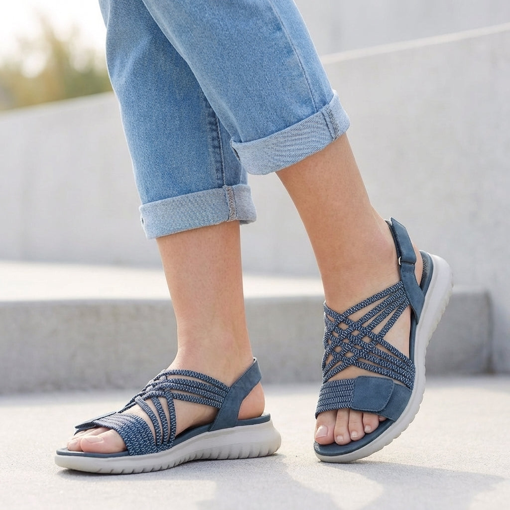 Comfortable women's criss-cross sandals, ideal supportive footwear for summer and casual fashion.