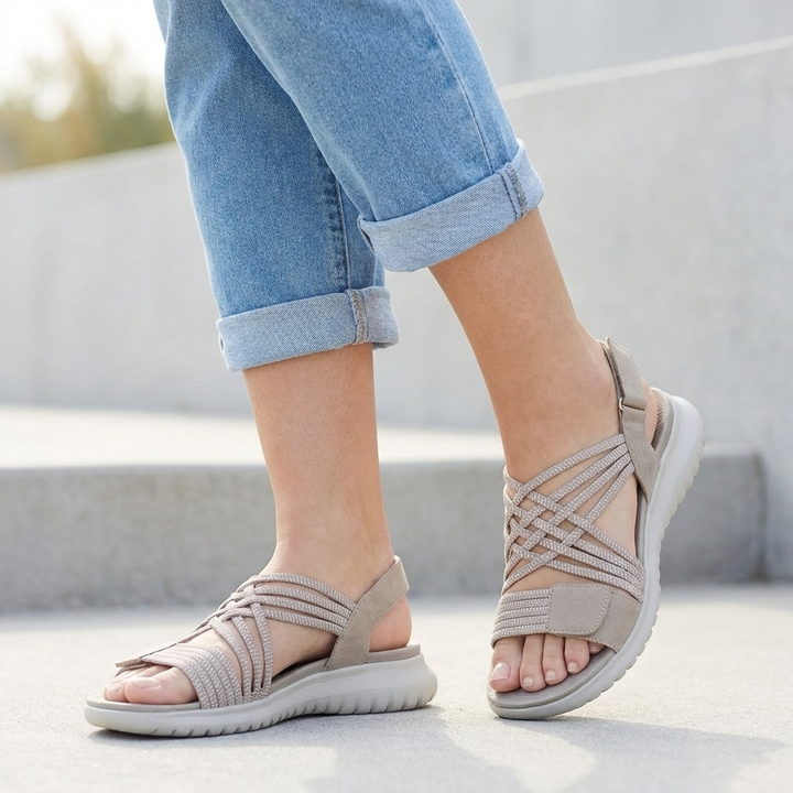 Criss-cross flat sandals for women, providing supportive orthopedic comfort for travel & summer.