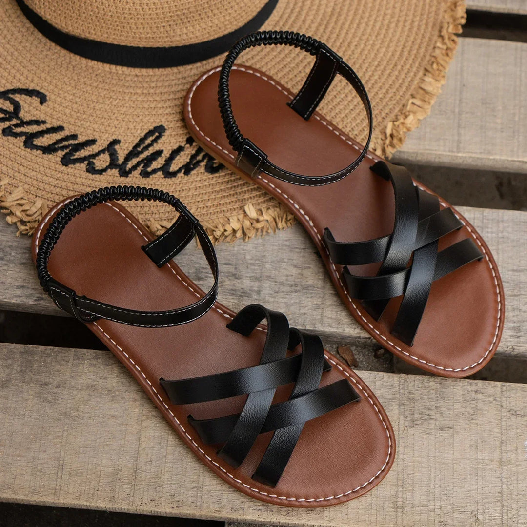 Comfortable women's orthopedic spring/summer sandals, featuring criss-cross straps & adjustable ankle.