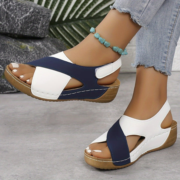 Stylish women's crossover wedge sandals, orthopedic design for arch support & comfortable footwear.