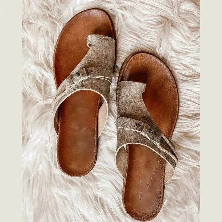Khaki women's comfort sandals featuring arch support, open toe, and toe loop. Ideal for all-day casual wear.