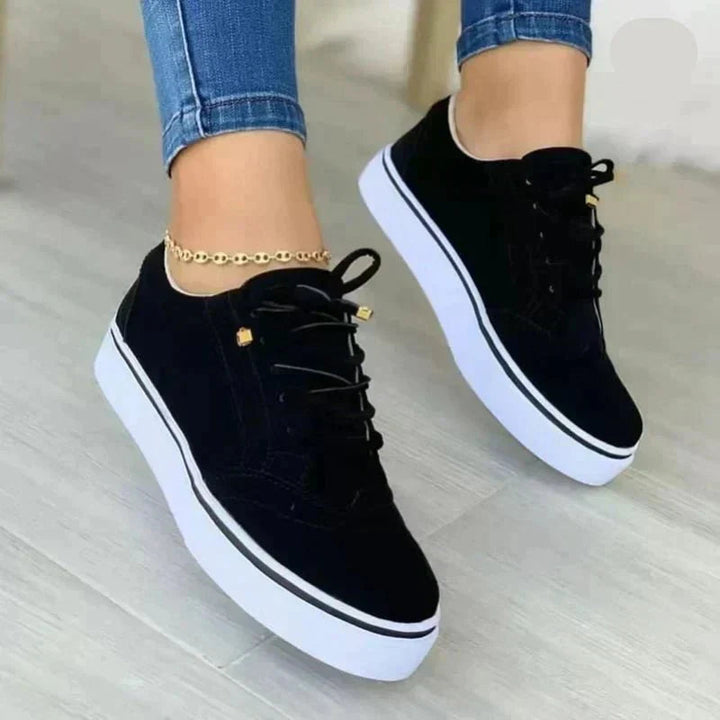 Durable women's platform oxfords, lace-up style with arch support, providing all-day comfort & elegance.