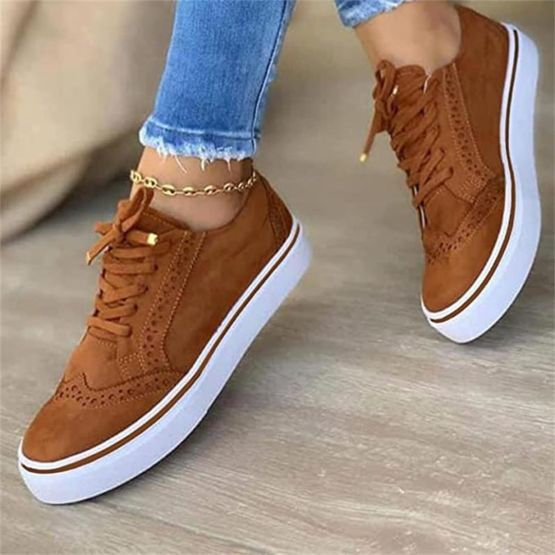 Stylish women's lace-up oxfords, wingtip design. Orthopedic shoes with arch support for comfortable walking.
