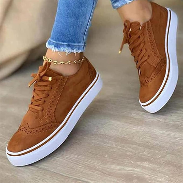Stylish women's lace-up oxfords, wingtip design. Orthopedic shoes with arch support for comfortable walking.