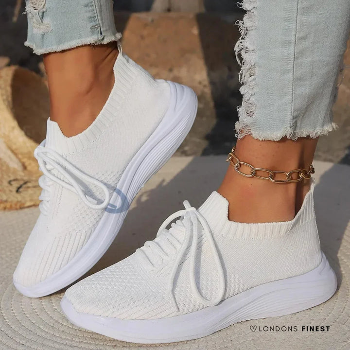 Women's orthopedic lace-up sneakers with sock-like ankle support, perfect for supportive everyday walking.