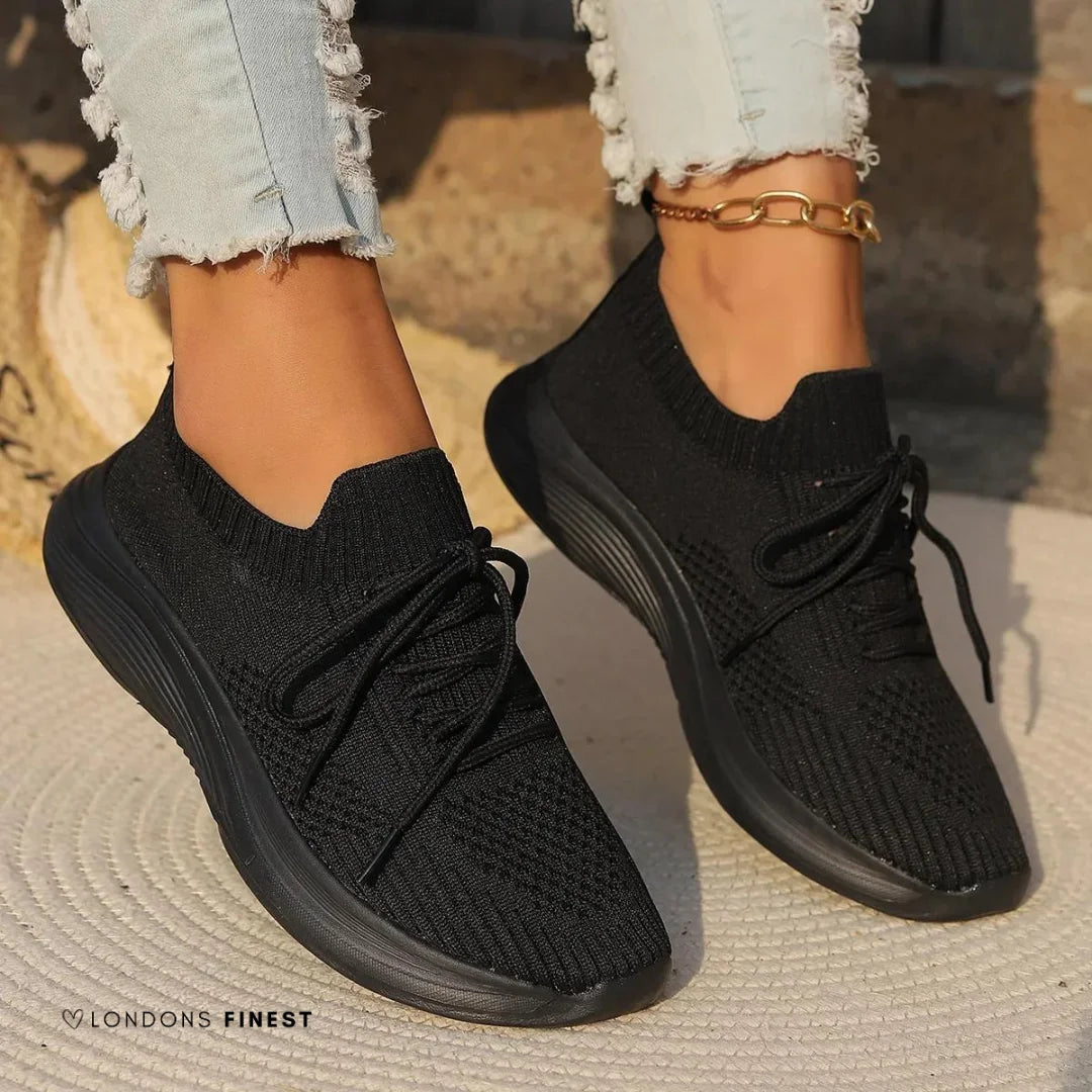 Stylish women's lace-up sneakers for active lifestyles, offering orthopedic foot support & comfort.
