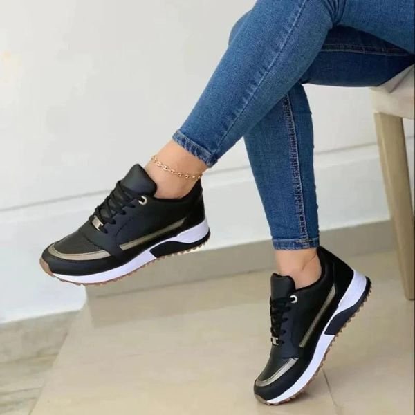 Ergonomic women's orthopedic sneakers, lace-up style with shock-absorbing comfort for daily active wear.