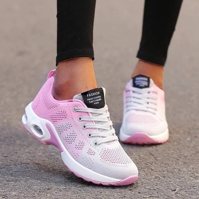 Side view: Women's comfortable orthopedic walking sneakers. Lightweight design for casual wear & athletic support.