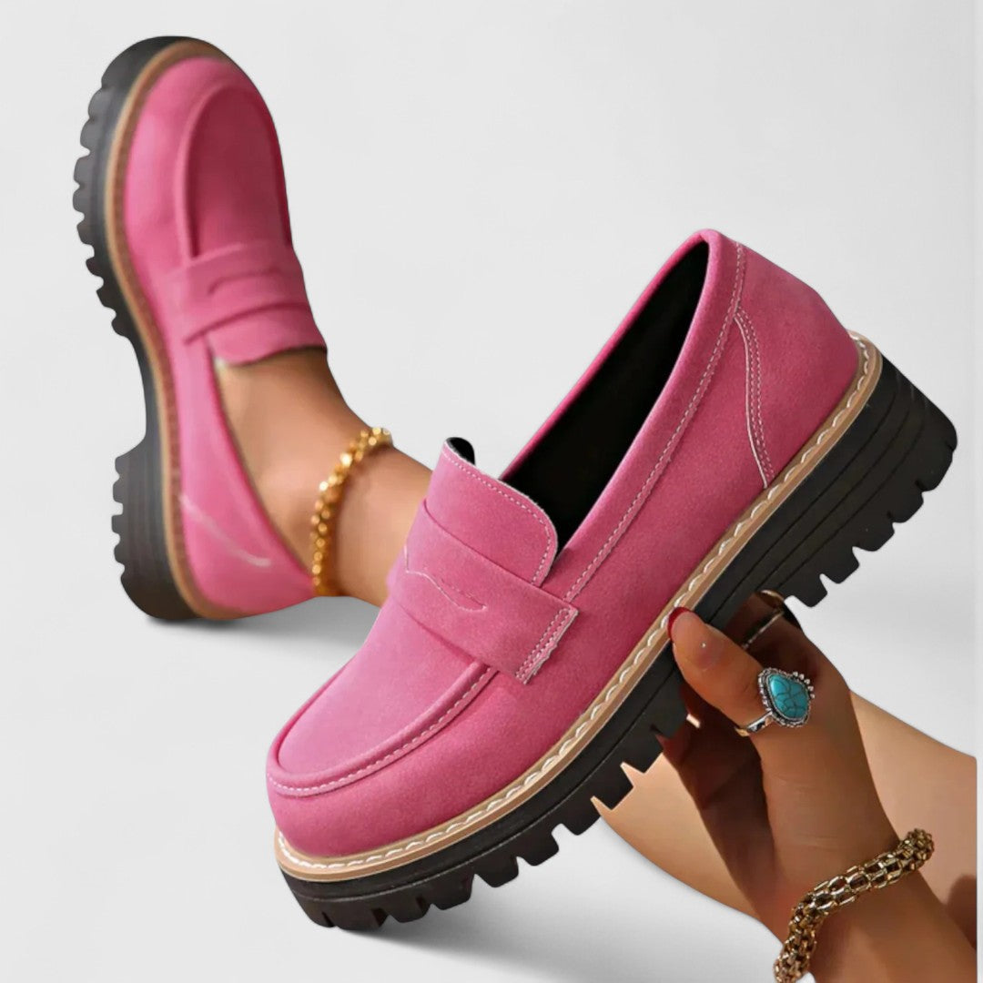 Elegant women's slip-on loafers. Classic style, versatile for everyday wear. Supportive footwear.