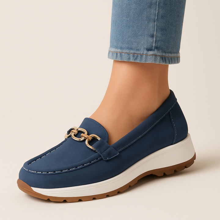 Elegant women's loafers with a sophisticated chain detail. Comfortable, supportive orthopedic slip-on shoes for ladies.