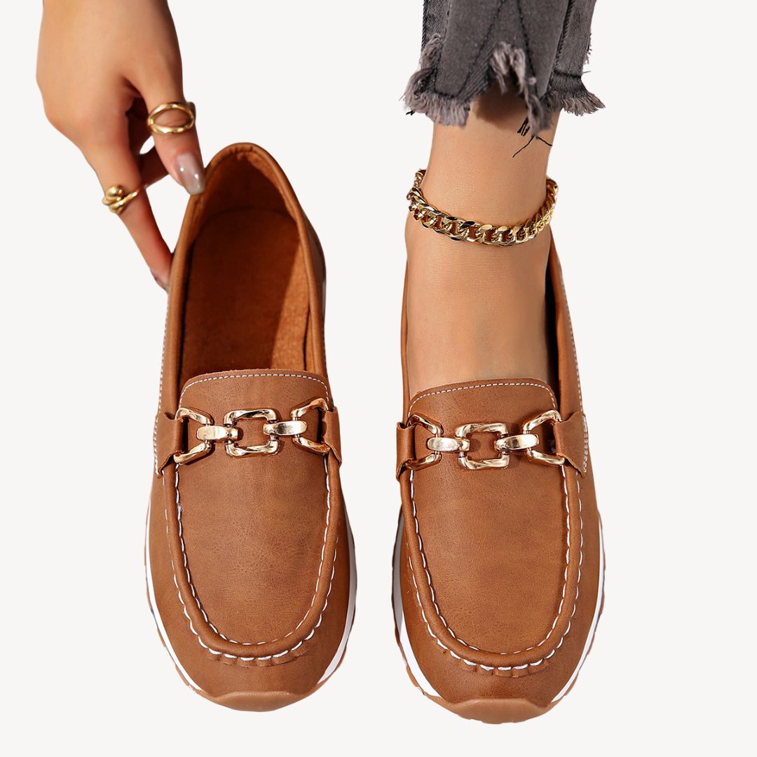 Stylish women's walking loafers: orthopedic comfort, slip-on design, and chic chain detail for daily wear.