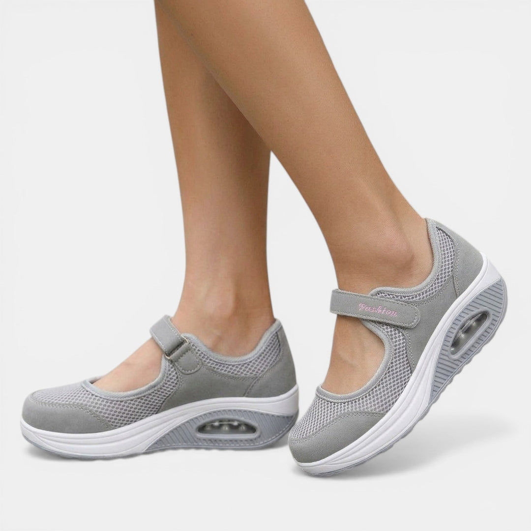 Women's orthopedic Mary Jane sneakers with adjustable strap, providing all-day comfort & active support.