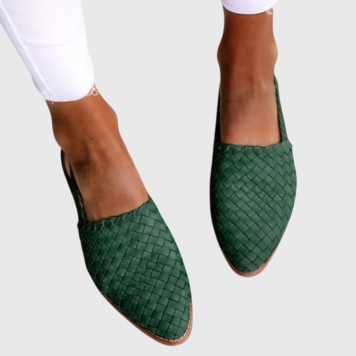 Elegant woven orthopedic mules, offering arch support & slip-on convenience.